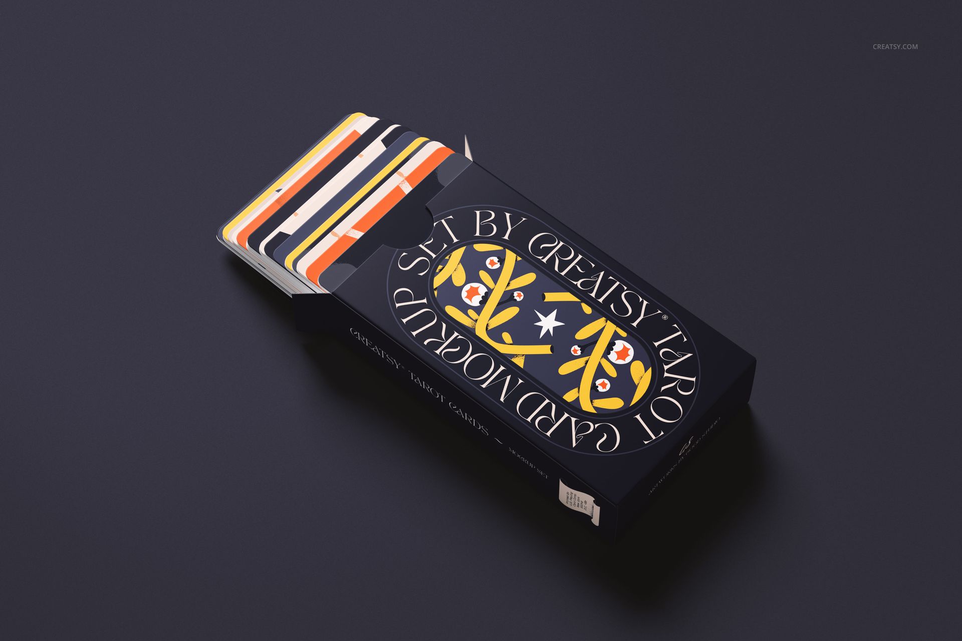 Tarot card set mockup featuring a partially open box with colorful cards on a dark surface, viewed from above.