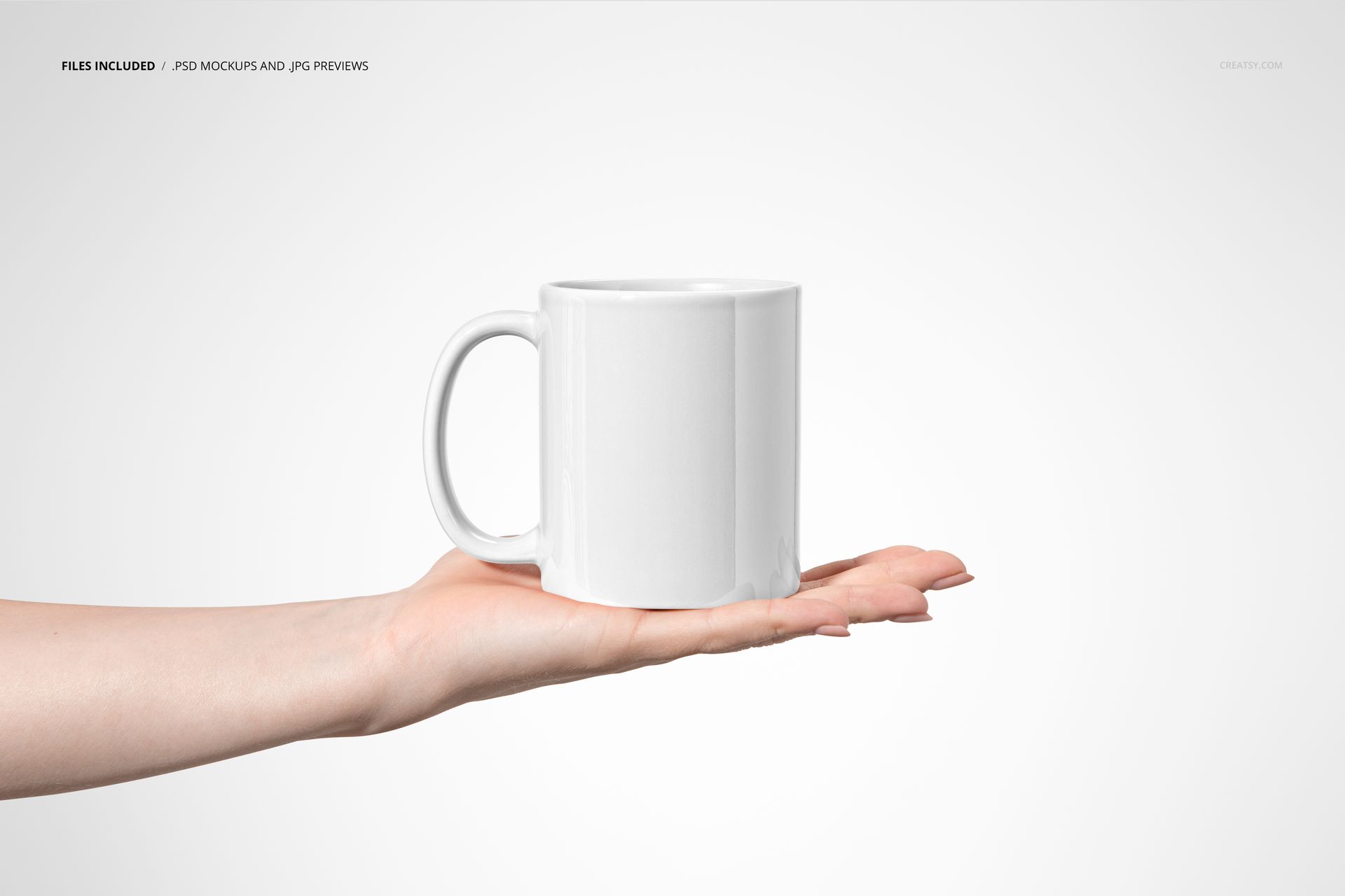 Sublimation coffee mug mockup featuring a clean white cup balanced on a hand, isolated on a neutral background.