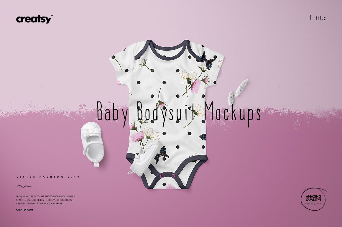 Front view of a baby bodysuit mockup with a white base, black trim, and floral and butterfly pattern on a pink background.