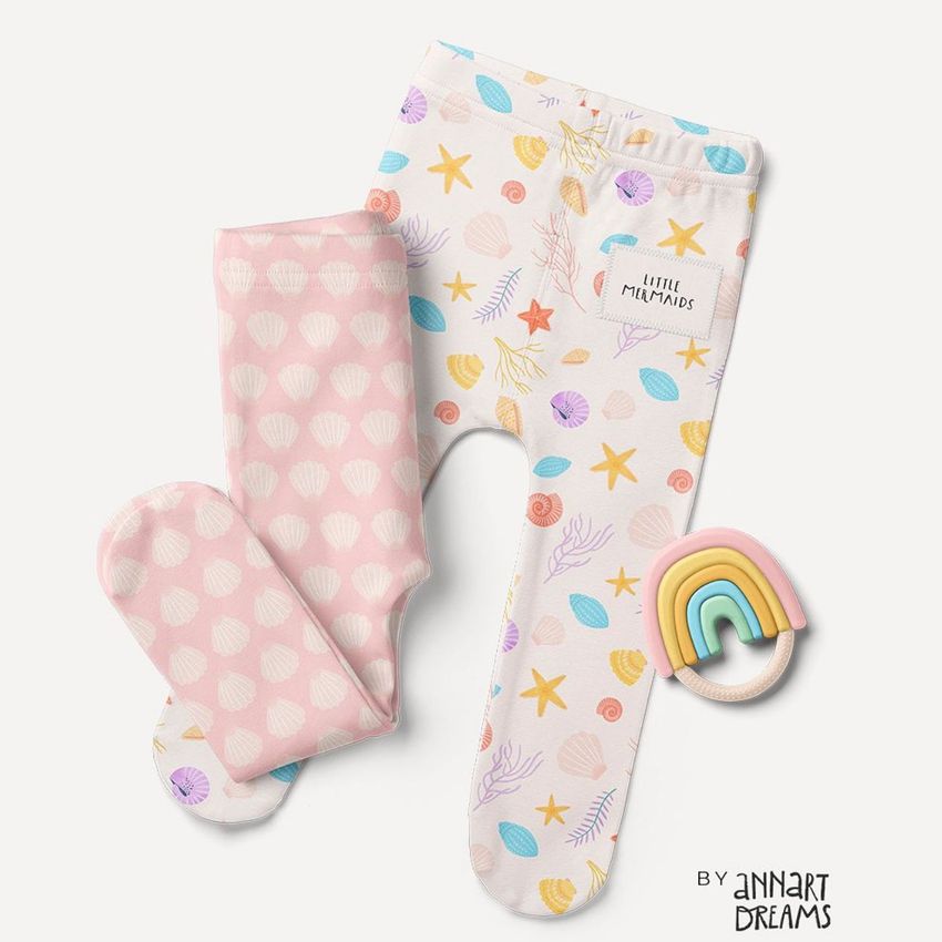 Footed baby leggings mockup featuring pastel sea-themed patterns with shells, starfish, and a pink shell print on a light background.