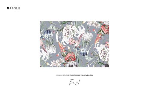 Cotton fabric mockup displaying a detailed botanical design in shades of white, blue, and red against gray.