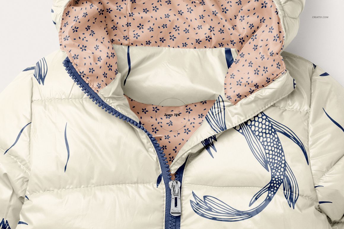Front view of a kids winter jacket mockup with cream color, blue fish pattern, and pink floral hood lining.