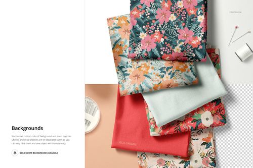 PSD mockup of assorted folded textiles in vibrant patterns and plain shades, viewed from a top-down perspective.