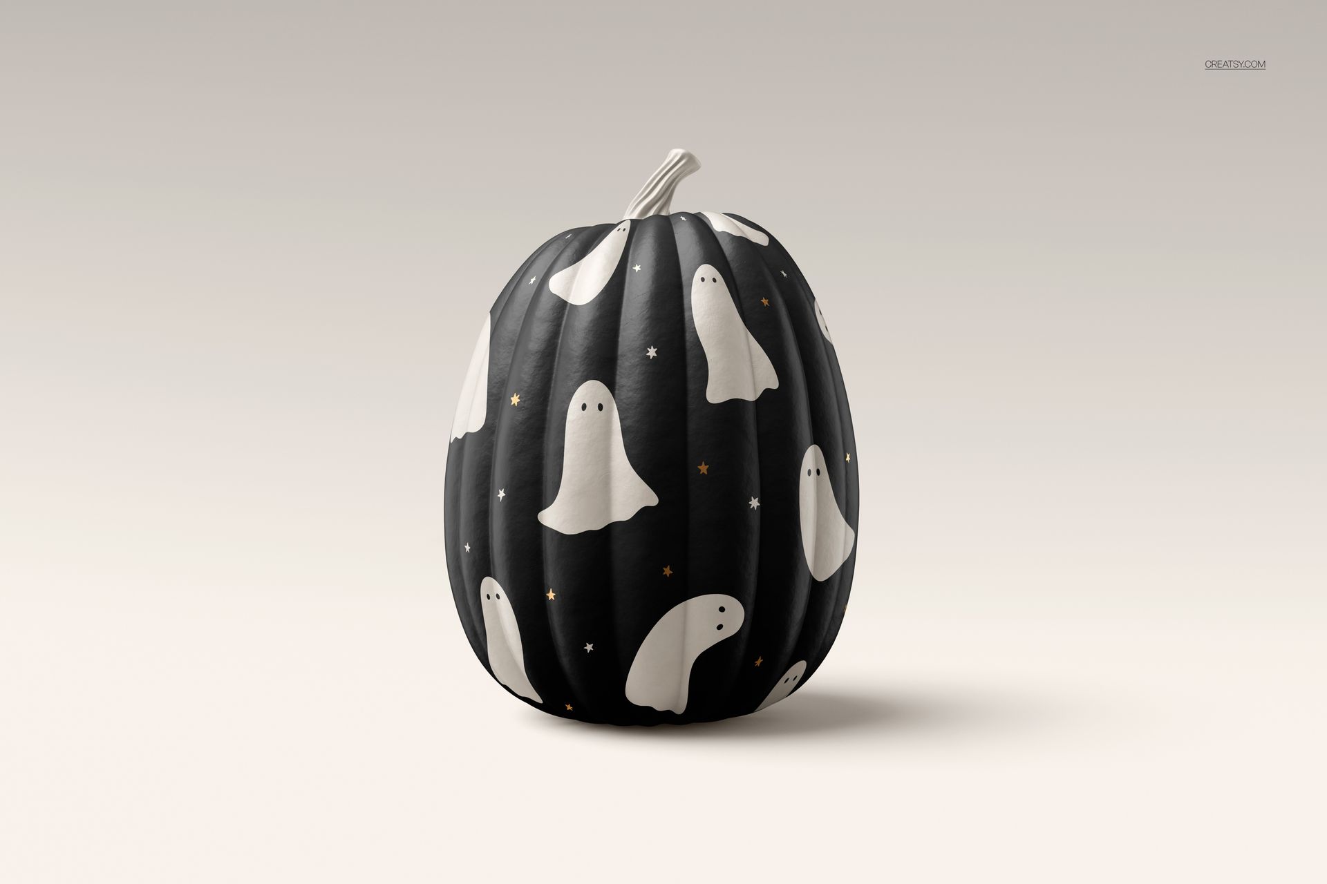 Front view of a Halloween pumpkin mockup with black surface decorated with white ghost illustrations and small stars.