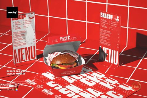 Burger bar menu display mockup featuring a burger in a branded box, standing menus, and a red tiled background.