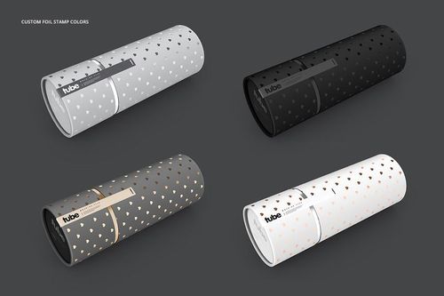 Paper tube packaging mockup set featuring four cylindrical tubes in different colors with dotted patterns, shown on a dark background.