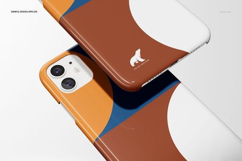 Modern PSD mockup showing iPhone 11 cases with shiny finish and bold geometric design in warm and cool tones.