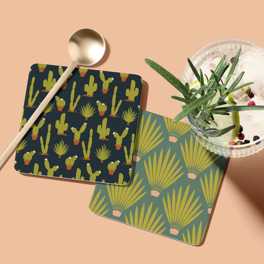 A drinkware mockup shows patterned coasters with desert plant motifs, accompanied by a drink with ice and garnish on a soft peach surface.