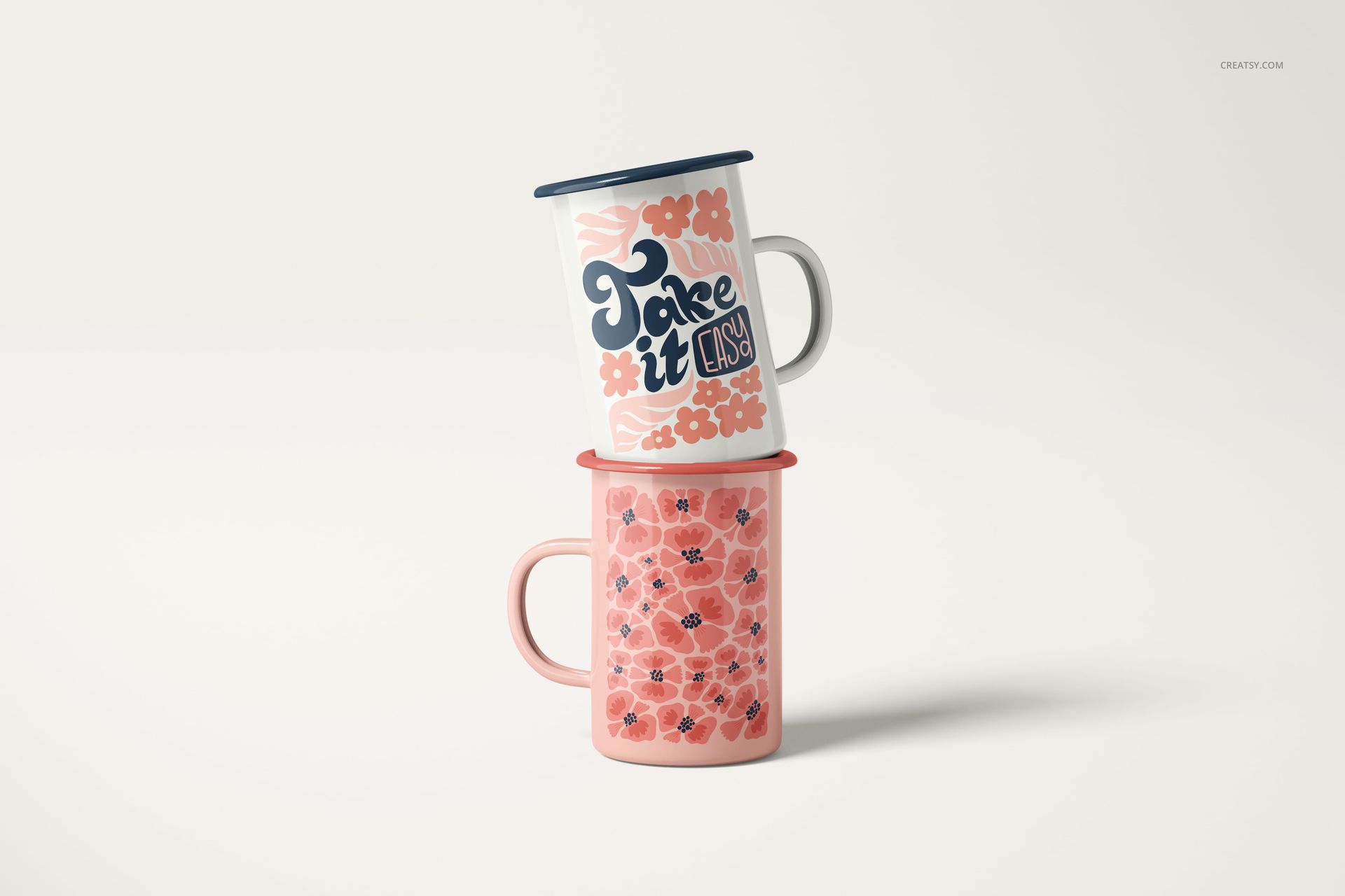 450ml enamel mug PSD mockup set with one mug decorated in flowers and the other with playful typography.