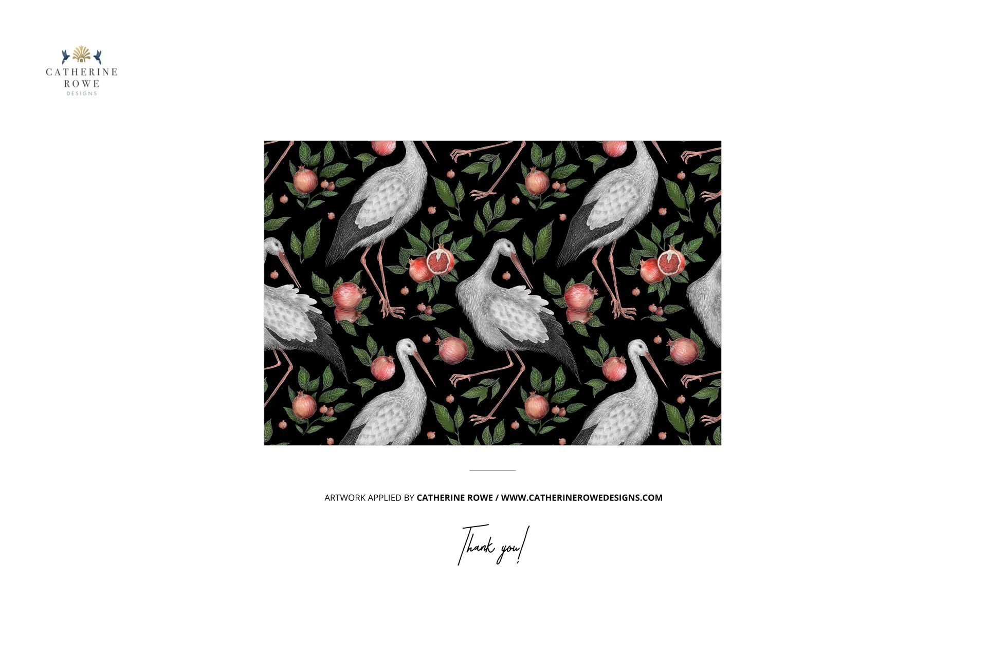 Rectangular mockup scene showing a repeating crane and floral pattern on a dark background, viewed from above.