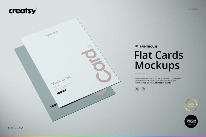 Flat cards mockup set showing two overlapping paper cards, one white and one blue, on a neutral surface.