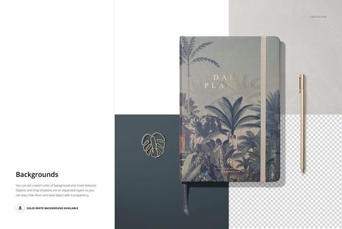 Leather notebook mockup featuring a botanical cover design, shown from a top view with a pen and leaf-shaped accessory.