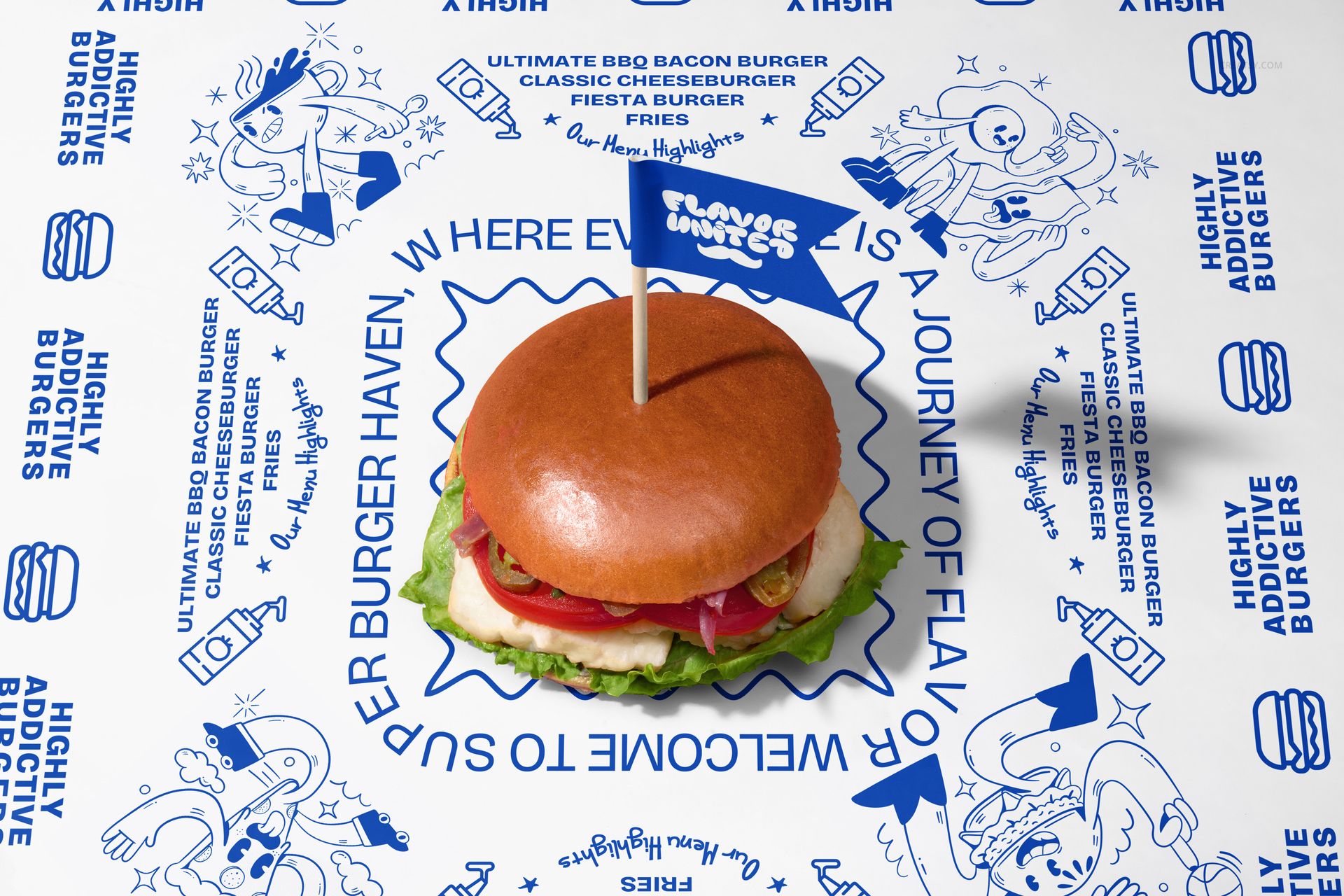 Vegan burger with lettuce, tomato, and onion on a branded paper wrap, viewed from above with a blue flag topper.