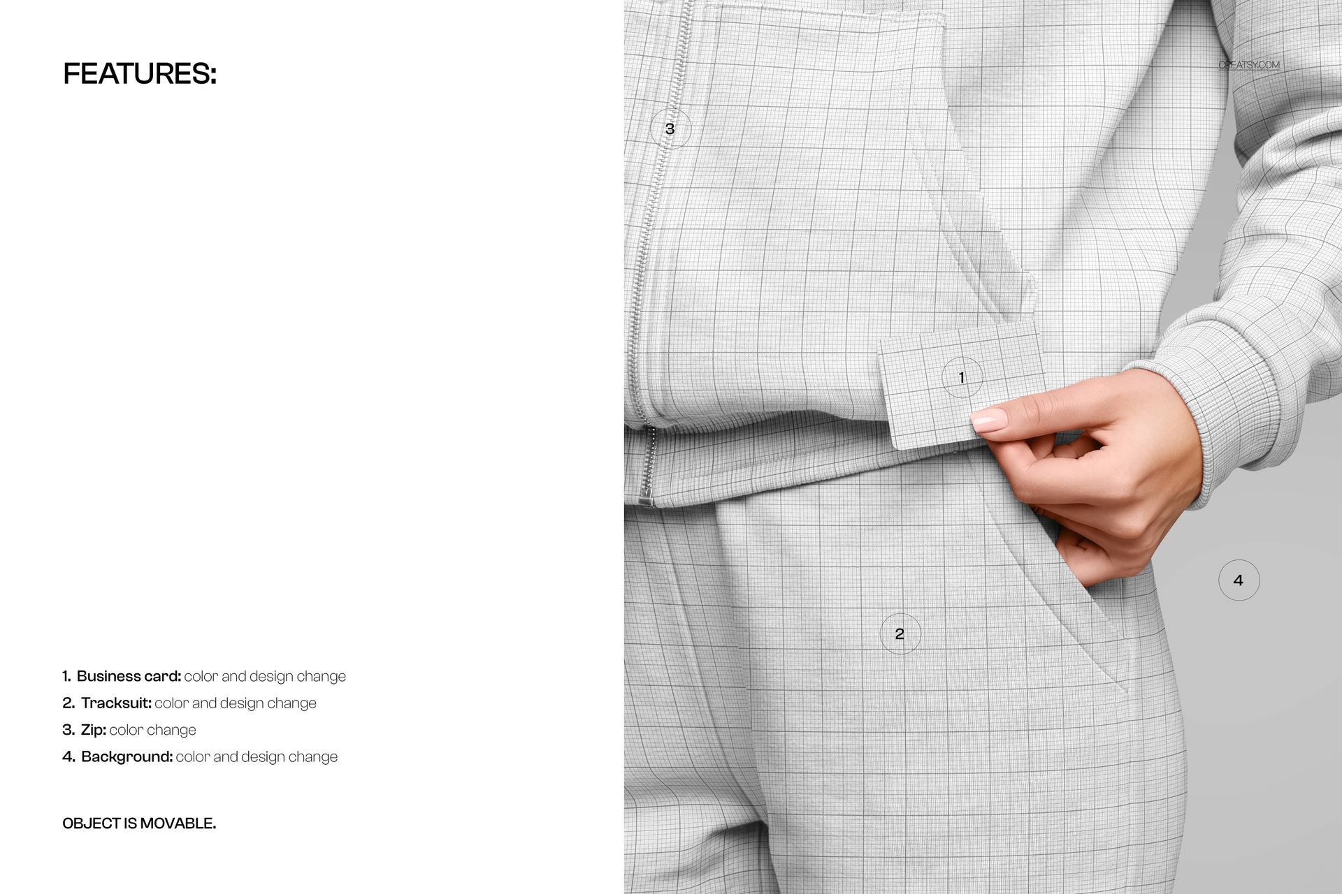 Close-up of a hand holding a business card against a light gray tracksuit with a subtle grid pattern, mockup scene.