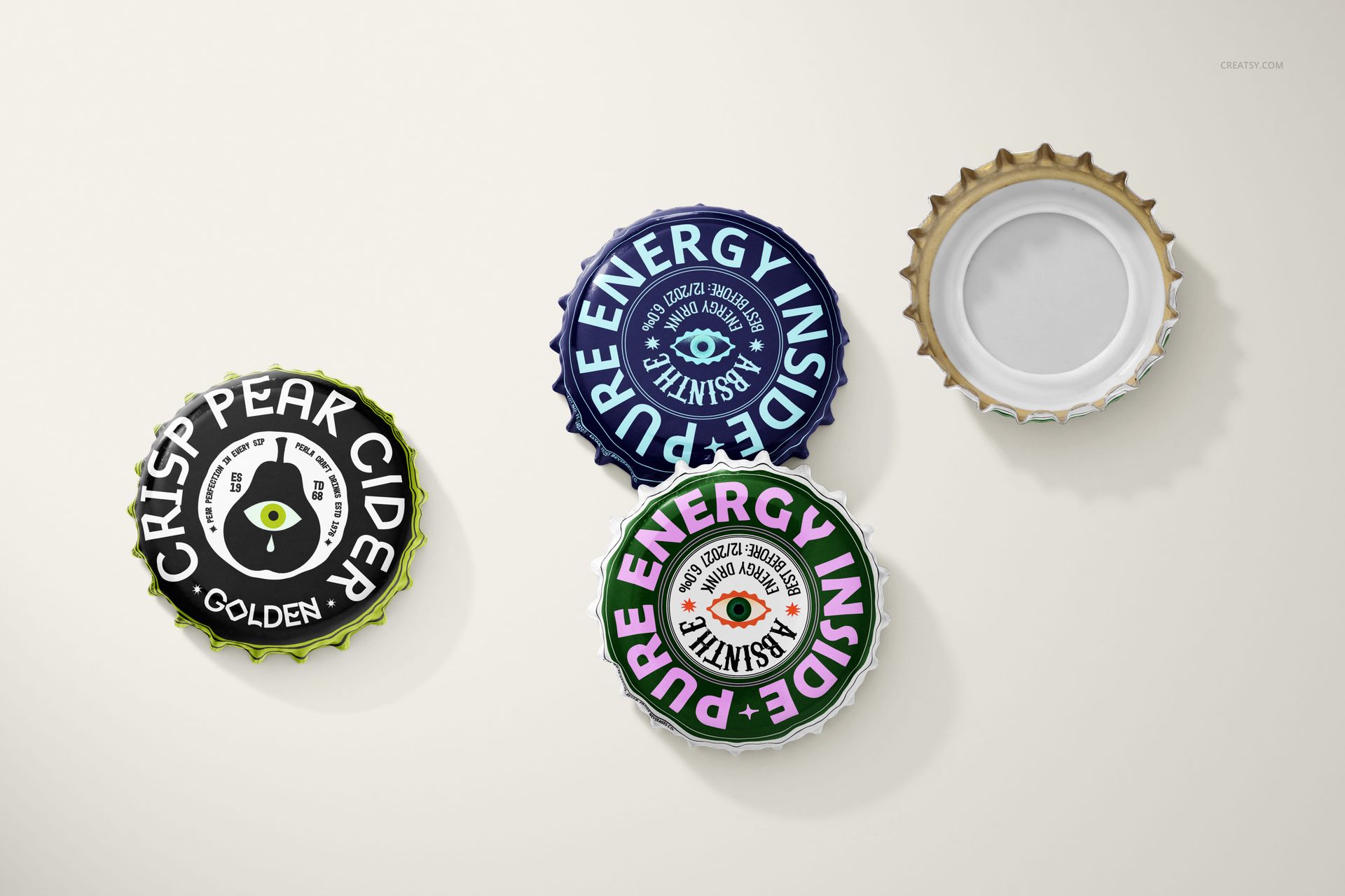 Bottle cap PSD mockup set showing three caps with printed labels and one cap turned over, all on a pale tabletop.