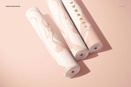 Yoga mat PSD mockup showing three rolled mats with minimal abstract patterns in pink tones, viewed from above.