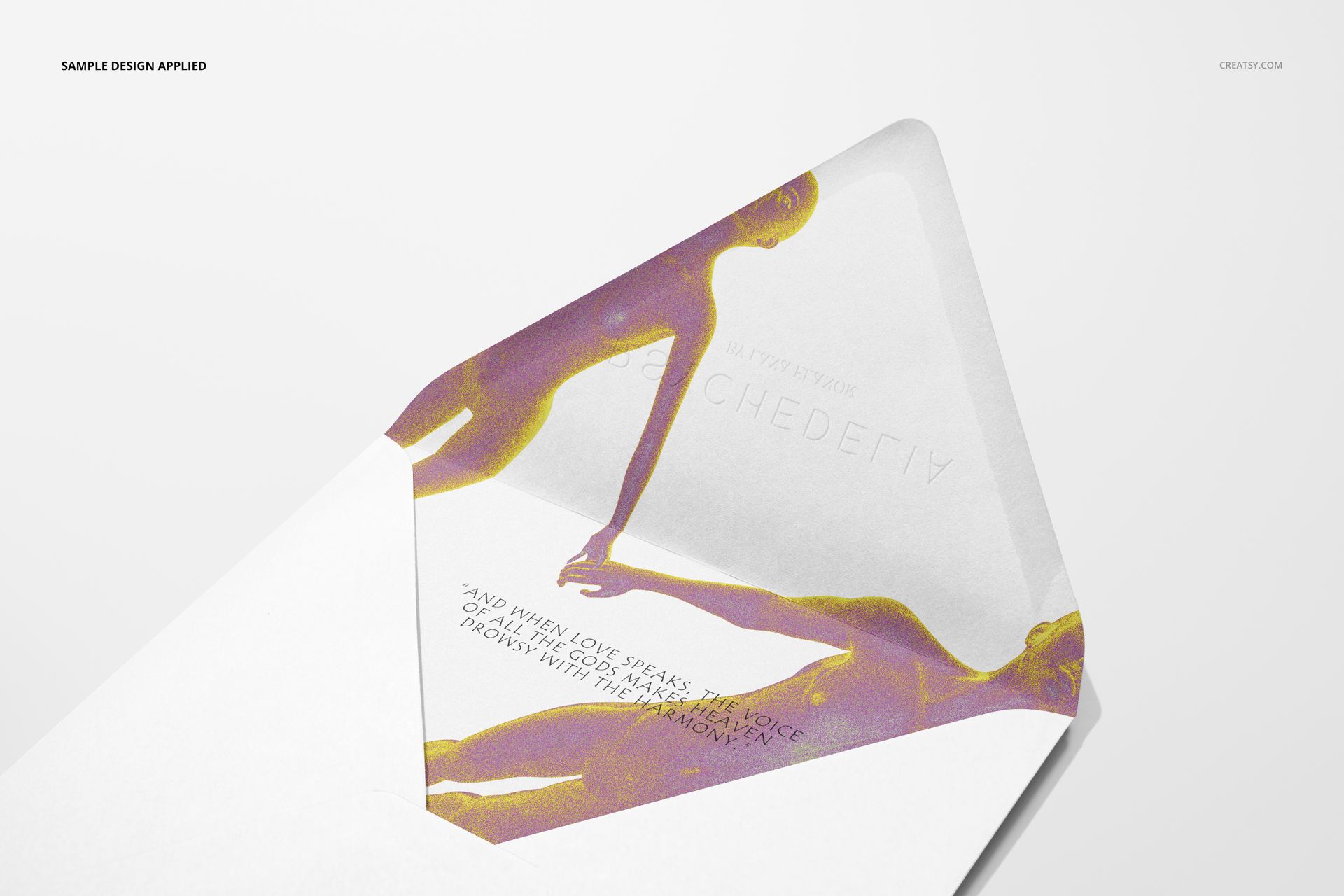 Stationery PSD mockup displaying a square card with vivid artwork inside a plain envelope, photographed from the top.