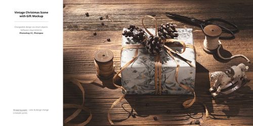 Vintage-style Christmas gift mockup featuring a decorated present with pinecones and ribbon in a cozy setting.