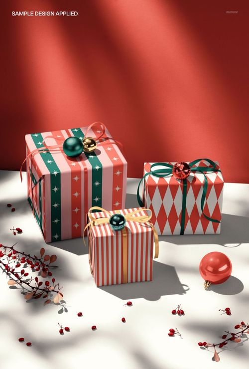 Christmas gift boxes featuring striped and diamond patterns, decorated with baubles and ribbons, shown in a mockup scene.