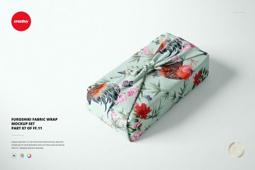 Furoshiki fabric wrap mockup featuring a pastel green textile with colorful flowers and rooster design, front view.