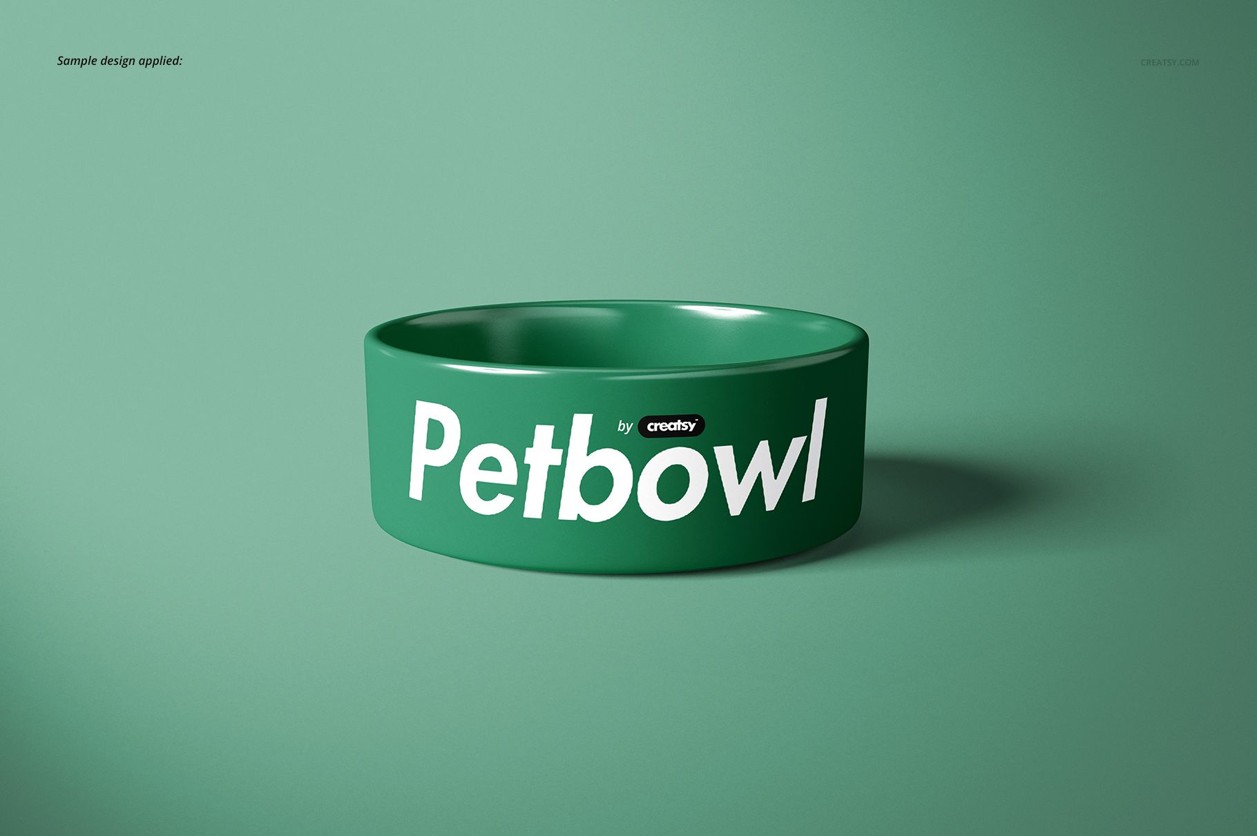 Green pet bowl with bold white text on the side, displayed on a matching green background in a front view mockup.