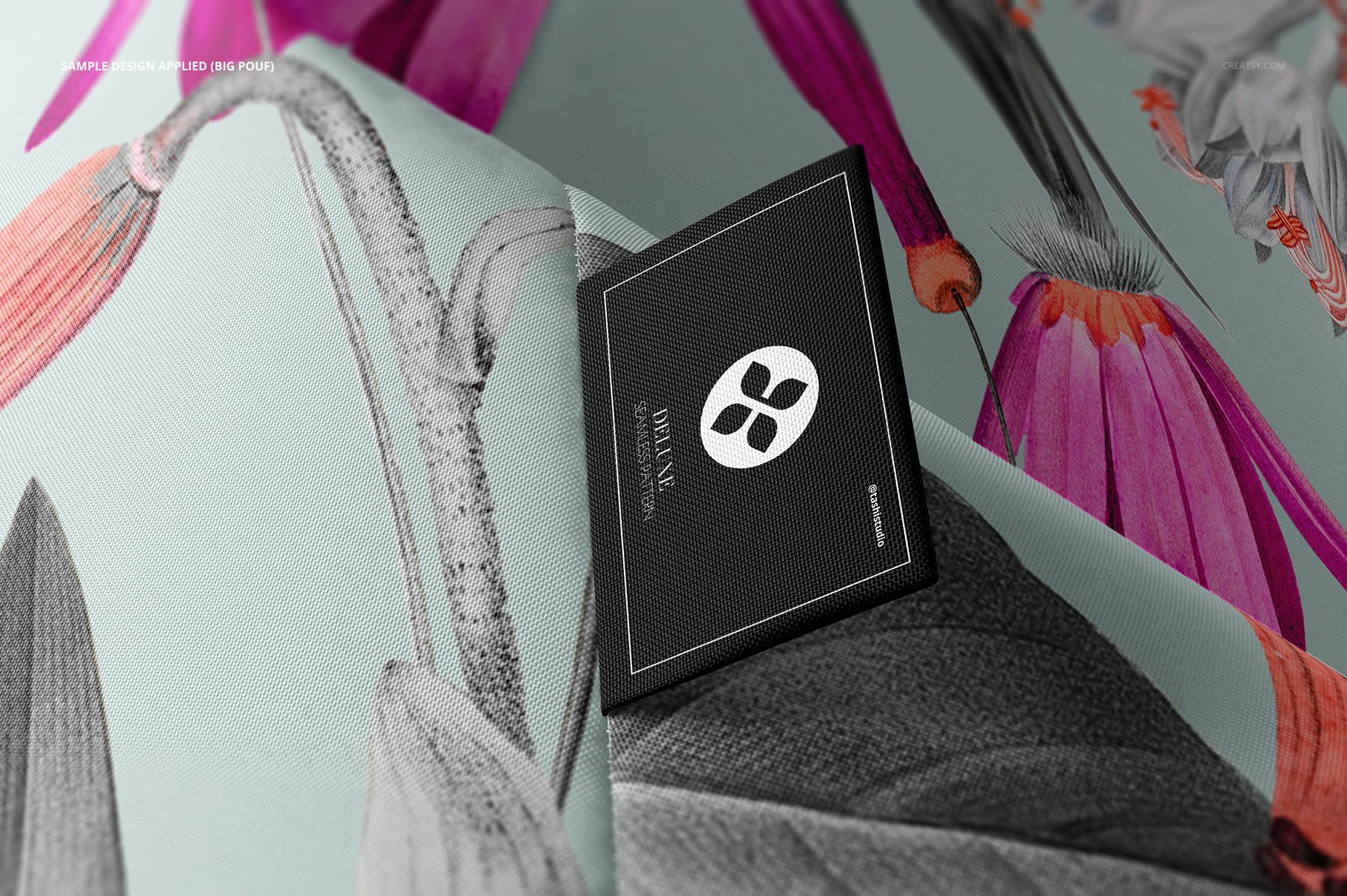 Close-up of a bean bag chair mockup featuring detailed floral patterns in pink, gray, and green tones.