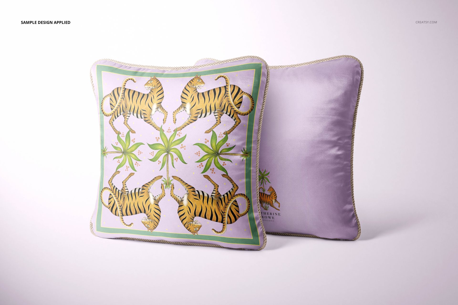 Silk cushion PSD mockup set with decorative braid, showing detailed tiger motif and solid pastel color on soft fabric.