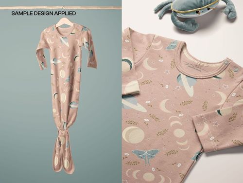 PSD mockup of a baby knotted gown featuring pastel planets, moons, and butterflies, displayed on a neutral background.
