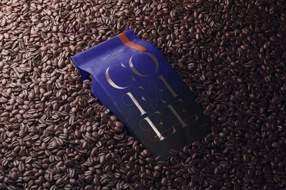 Coffee Packaging with Coffee Beans Background Mockup